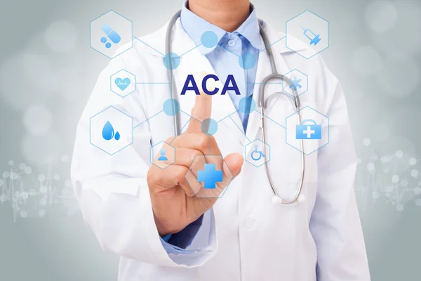 Doctor with ACA sign — Stock Photo, Image