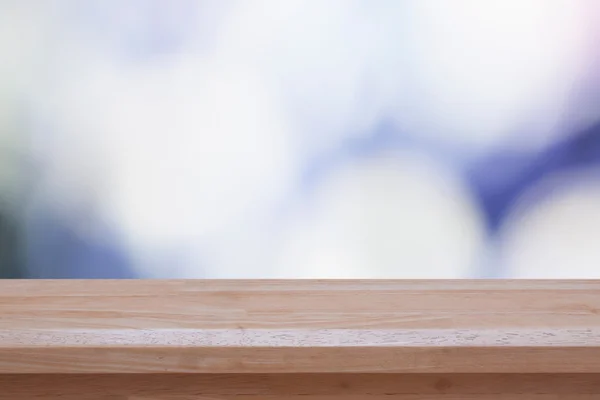 Tavolo in legno con sfondo astratto — Foto Stock