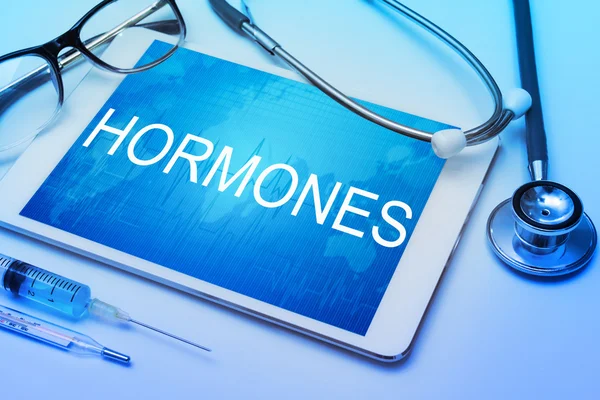 Digital tablet with hormones sign — Stock Photo, Image