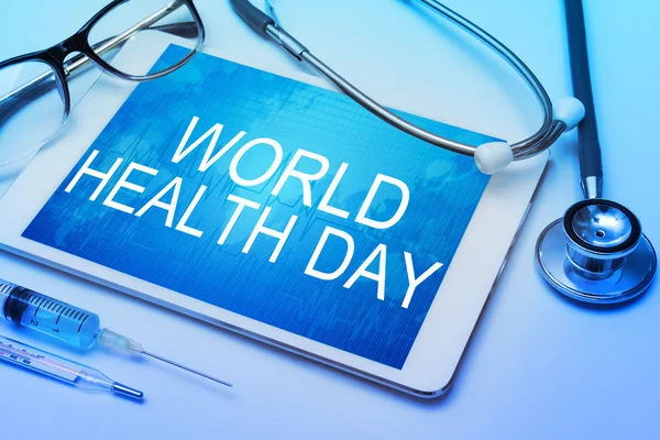 Tableta digital con signo del día mundial de la salud — Foto de Stock