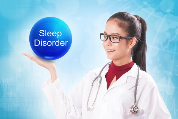 Medico femminile con sfera di cristallo blu con segno di disturbo del sonno su sfondo medico . — Foto Stock