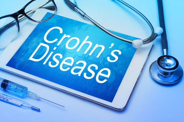 Zeichen der Morbus Crohn auf Tablette — Stockfoto