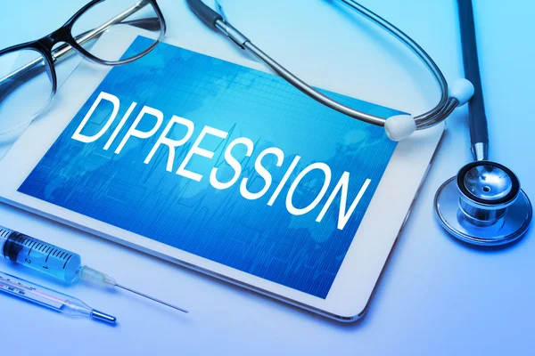 Segno di depressione sulla compressa — Foto Stock