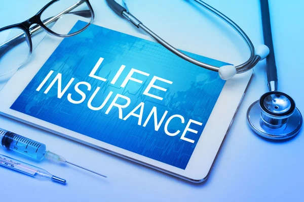 Life insurance sign on tablet — Stock Photo, Image