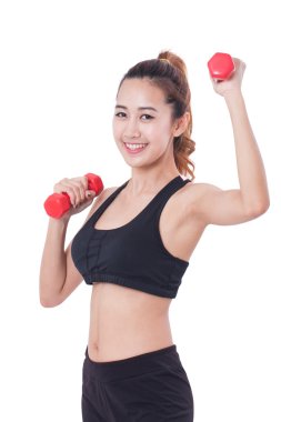 Mutlu genç kadın fitness egzersiz el ağırlıkları ile yapmak. sağlıklı yaşam tarzı. 