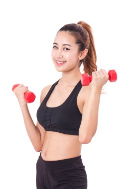 Mutlu genç kadın fitness egzersiz el ağırlıkları ile yapmak. sağlıklı yaşam tarzı. 