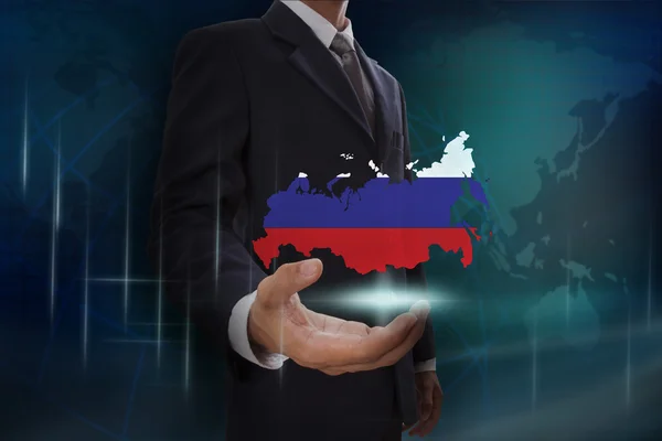 Businessman showing map of Russia — Stock Photo, Image