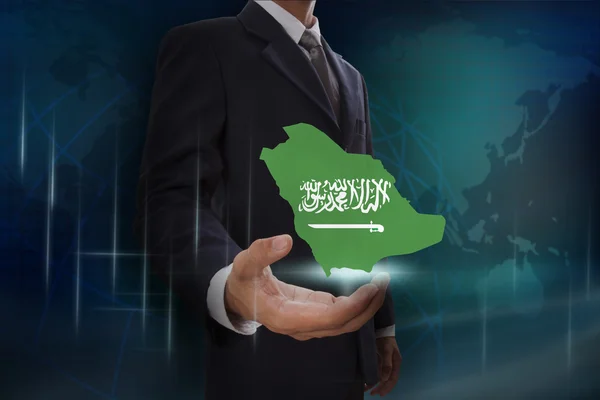 Uomo d'affari mostra la mappa di Arabia Saudita — Foto Stock
