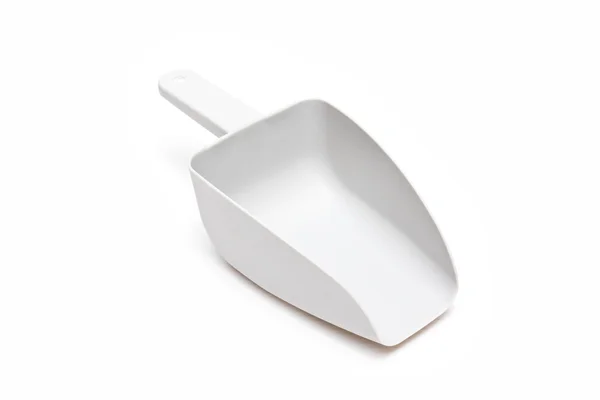 White plastic measuring spoon — Stock Photo, Image