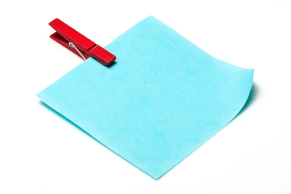 Blue reminder note with color clothes pins — Stock Photo, Image