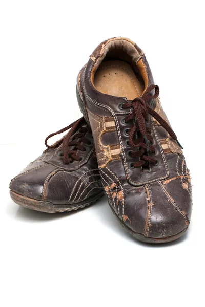 Zapatos viejos sobre fondo blanco —  Fotos de Stock