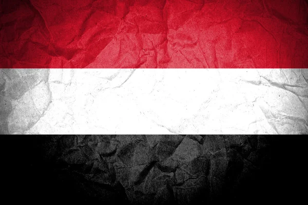 Yemen flag on crumpled paper — Stock Photo, Image