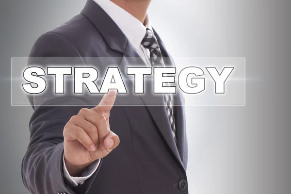 Businessman hand touching strategy — Stock Photo, Image