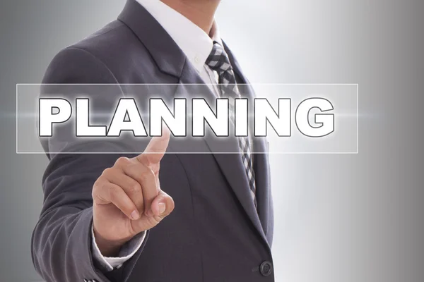 Businessman hand touching planning — Stock Photo, Image