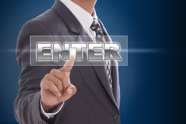 Biznesmen ręką dotykając enter — Zdjęcie stockowe