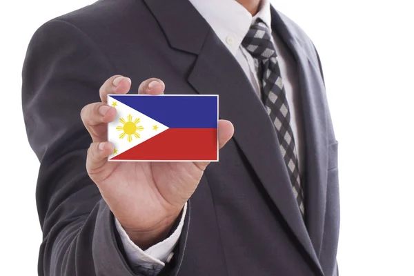 Empresario sosteniendo bandera de Filipinas — Foto de Stock