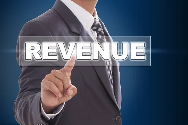 Businessman hand touching revenue on screen — Stock Photo, Image