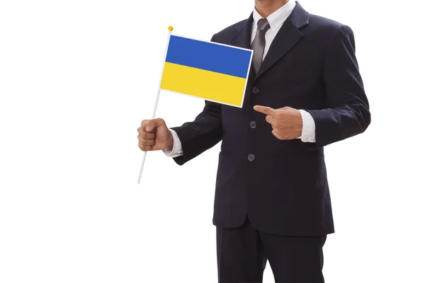 Businessman in suit holding of Ukraine flag — Stock Photo, Image