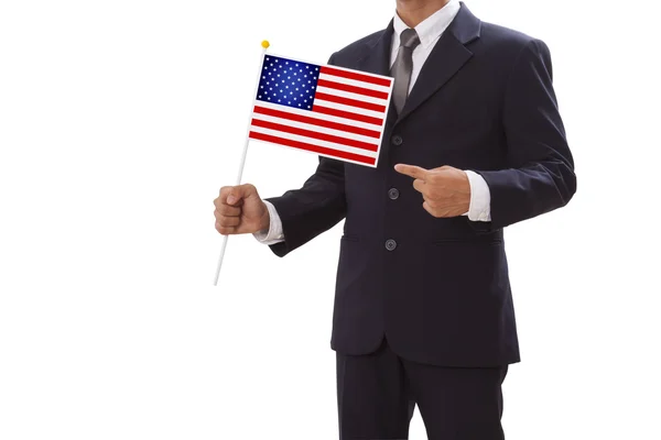 Biznesmen w garniturze gospodarstwa flagi Usa — Zdjęcie stockowe