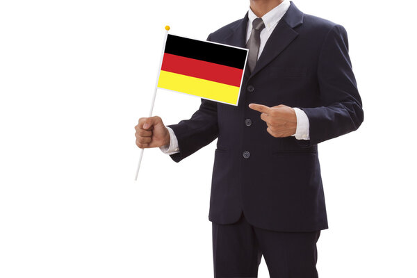 Businessman in suit holding of the Germany flag