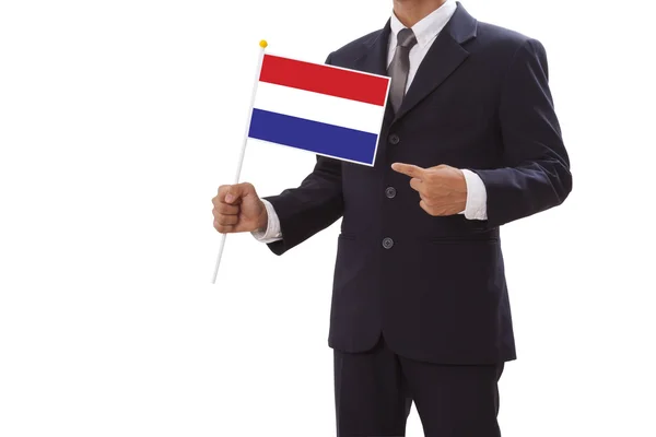Empresário de terno segurando a bandeira dos Países Baixos — Fotografia de Stock