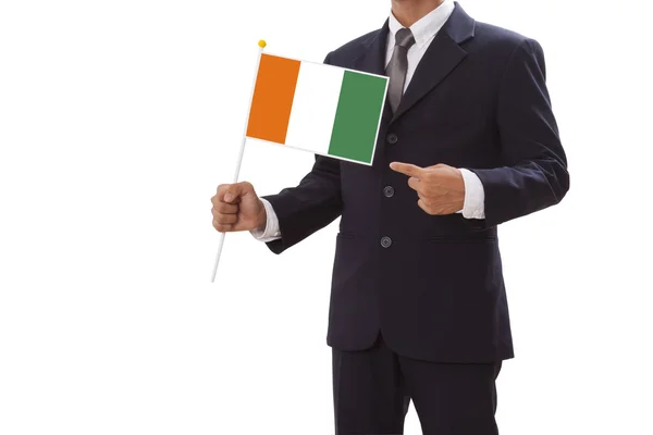 Geschäftsmann im Anzug mit der Flagge der Elfenbeinküste — Stockfoto