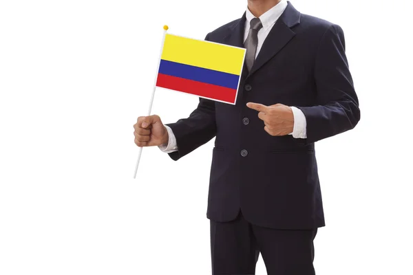 Businessman in suit holding of the colombia flag — Stock Photo, Image