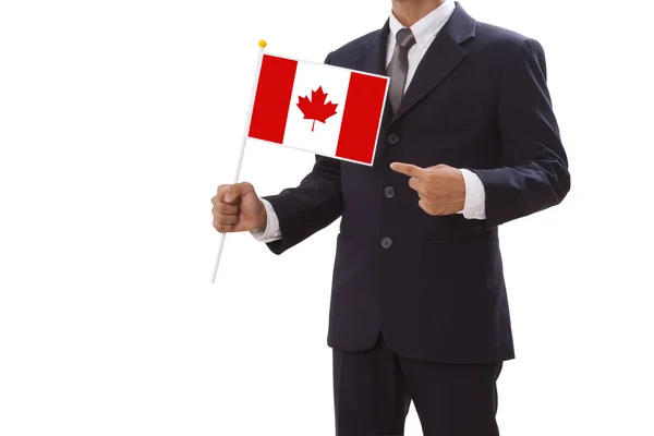 Homme d'affaires en costume portant le drapeau du Canada — Photo