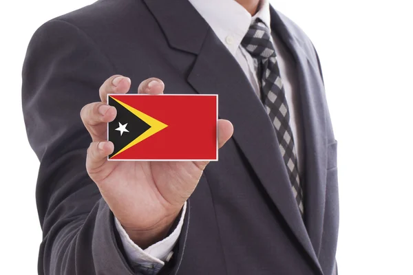 Uomo d'affari con bandiera di Timor Est — Foto Stock