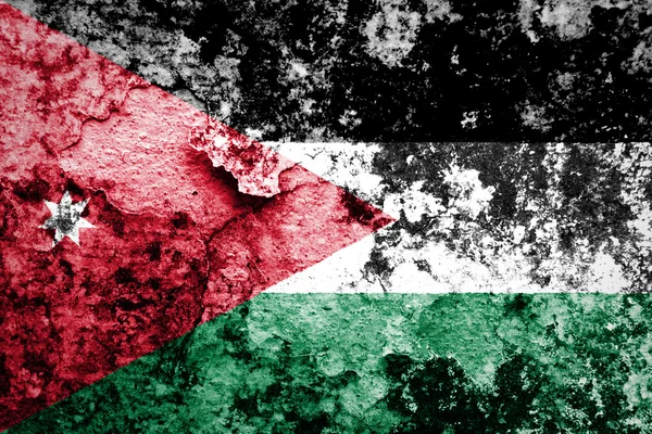 Bandeira jordaniana pintada na parede grunge — Fotografia de Stock