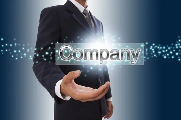 Businessman hand showing company — Stock Photo, Image
