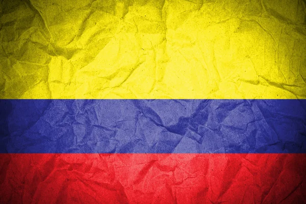 Columbia Bandera sobre papel grunge —  Fotos de Stock