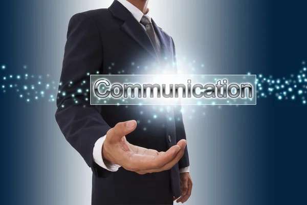 Empresário com palavra de comunicação — Fotografia de Stock