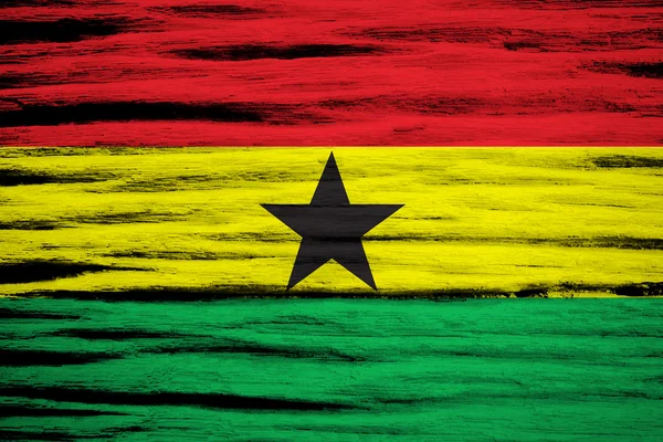 Ghana flagga på gammal trä bakgrund — Stockfoto