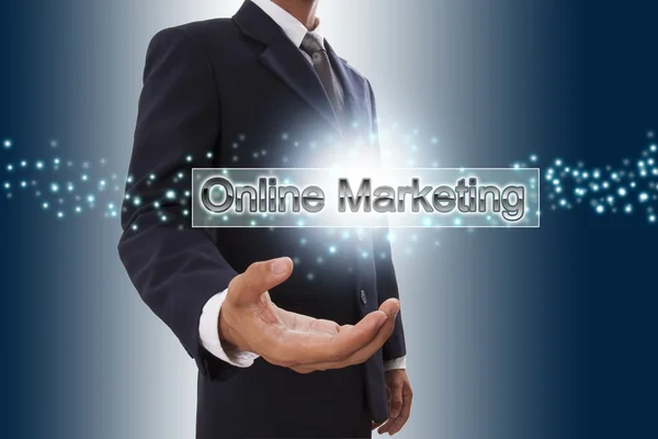 Businessman hand showing online marketing button on virtual screen. — Stock Photo, Image