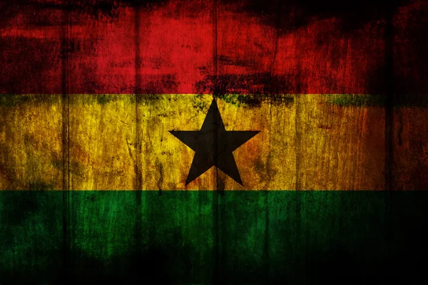 Ghana Bandera sobre fondo de madera vieja — Foto de Stock