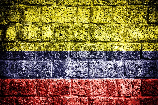 Colombia flagga på tegelvägg — Stockfoto