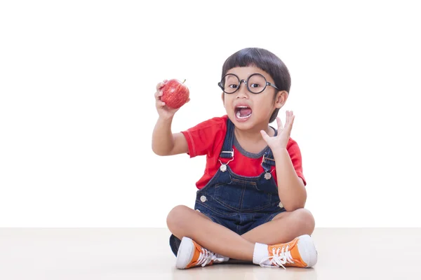 Μικρό αγόρι εκμετάλλευση κόκκινο μήλο — Φωτογραφία Αρχείου