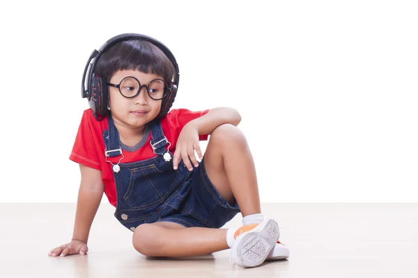 Szczęśliwy chłopiec ze słuchawkami — Zdjęcie stockowe
