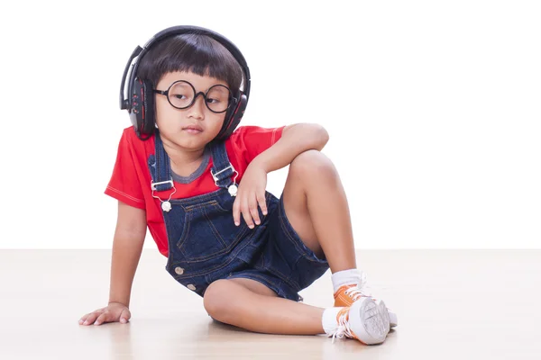 Lycklig pojke med hörlurar — Stockfoto