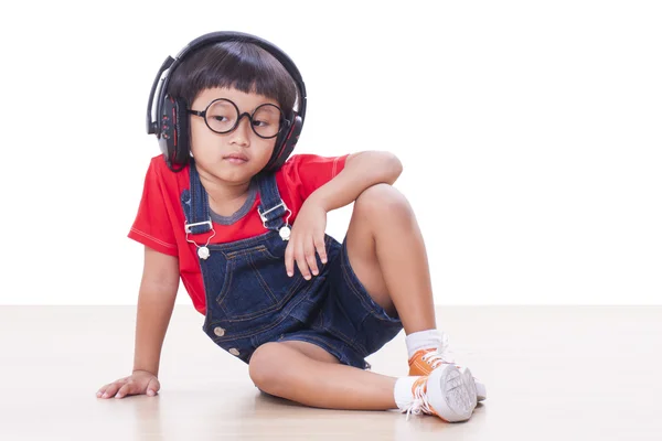 Gelukkige jongen met koptelefoon — Stockfoto