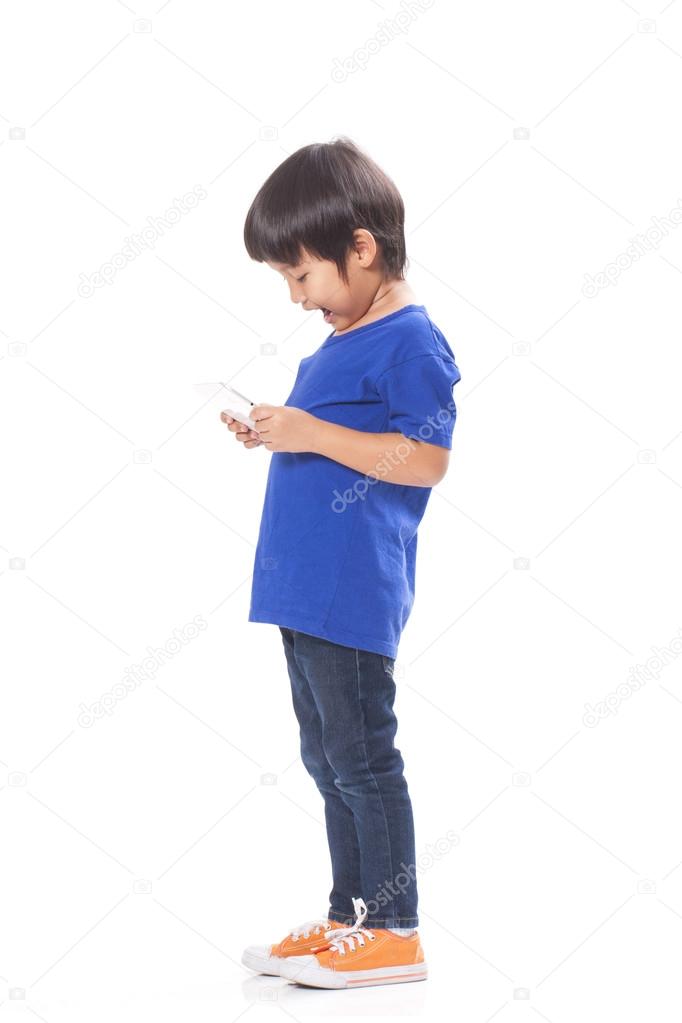 Cute boy playing a game on computer tablet
