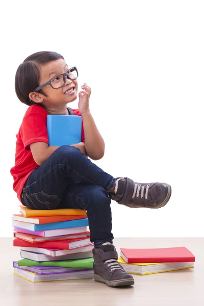 Cute boy holding a book — Stock Photo, Image