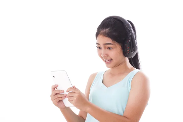 Mujeres jóvenes con tablet PC y auriculares . — Foto de Stock