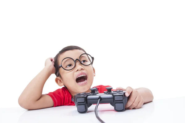 Boy playing video game — Stock Photo, Image