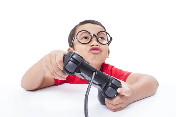 Boy playing video game — Stock Photo, Image