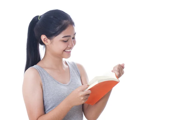 Mujeres jóvenes leyendo un libro Imagen de stock