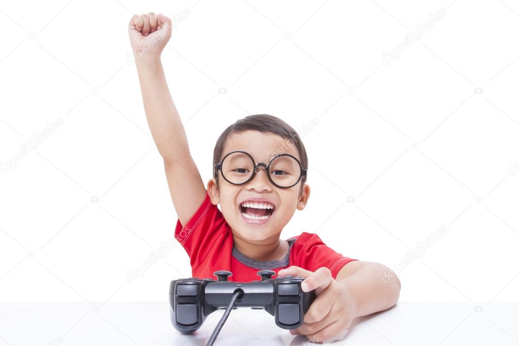 Boy playing video game with glasses