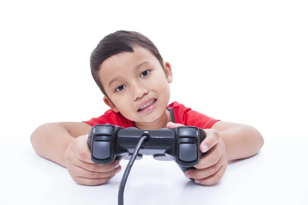 Menino jogando jogo de vídeo com óculos — Fotografia de Stock