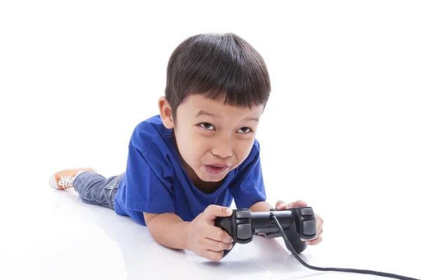 Chlapec hraje videohru — Stock fotografie